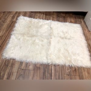2 faux fur rugs 2x3
